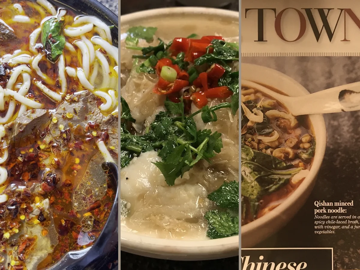 Plates of Chinese dishes on a restaurant table.