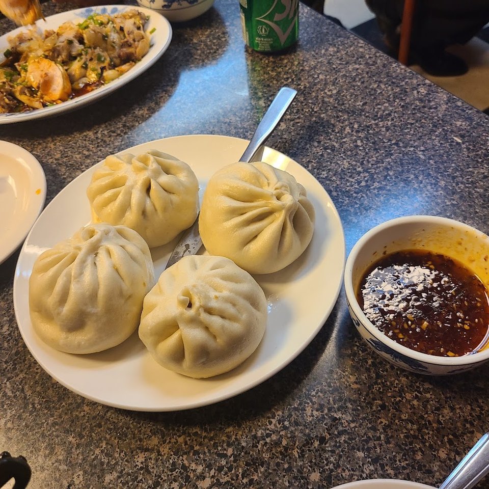 Steamed Pork with Sour Cabbage Dumplings