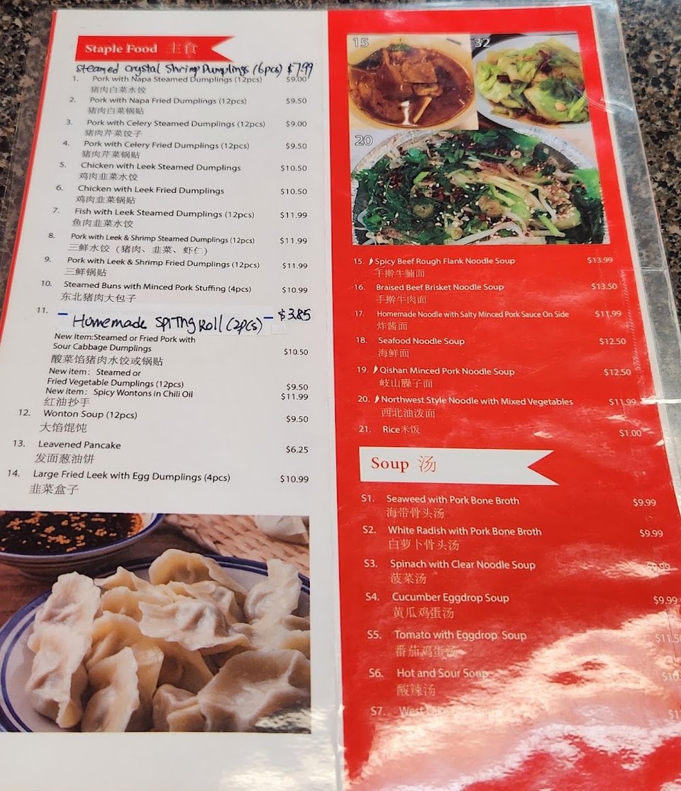 Chinese menu with hotpot, seafood, and vegetables.